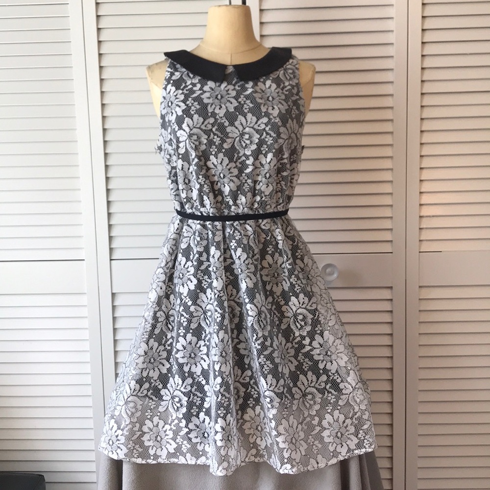 White material over black, with Bermuda collar.